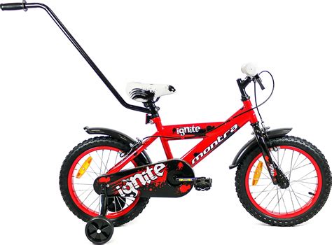 Czerwony rowerek dziecięcy BMX 12 cali z motywem strażaka, z małymi kołami bocznymi, stojący na tle zielonego trawnika.