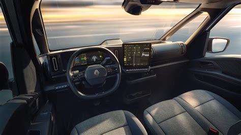 Widok wnętrza i ekranu multimedialnego Renault Trafic Van E-Tech electric
