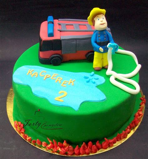 Ilustracja zestawu dekoracji na tort ze Strażakiem Samem