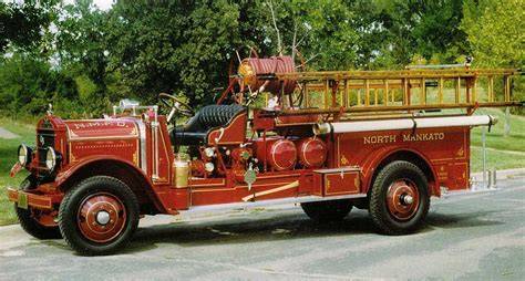 Historic photo of a post-war fire engine based on an American truck chassis (e.g., Dodge WC-51)