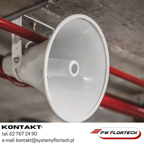 Schemat dźwiękowego systemu ostrzegawczego (DSO), z centralą, mikrofonem alarmowym, generatorami komunikatów, wzmacniaczami mocy i liniami głośników.