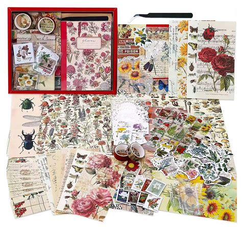 Zestaw podstawowych materiałów do scrapbookingu: papiery, klej, nożyczki, ozdoby.