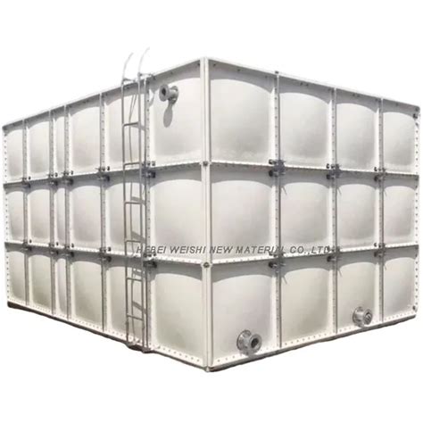 Illustration showing modular tank panels being assembled inside a building