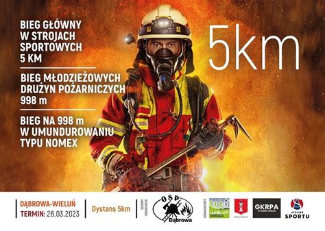 Photo of firefighters competing in the III Bieg Strażaka Dąbrowa 2024, focusing on the NOMEX run