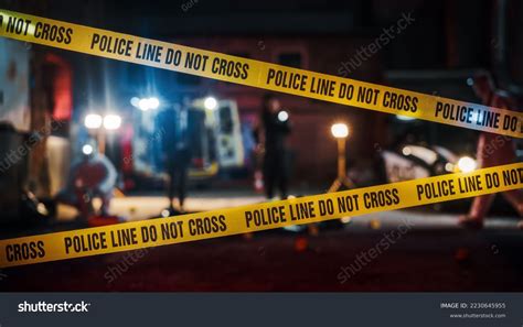 Thematic photo of police tape or a burnt-out building scene, emphasizing the criminal investigation aspect.