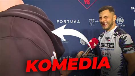 komiczna scena strażaka uciekającego przed wybuchającą oponą