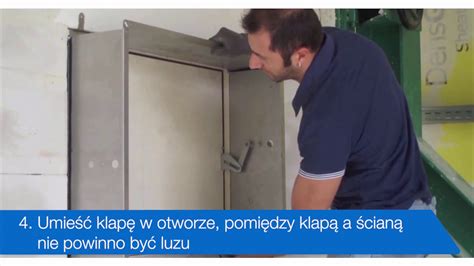 Zdjęcie przedstawiające ekipę serwisową przeprowadzającą przegląd klapy oddymiającej.