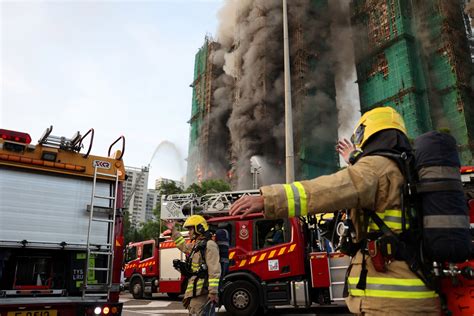 Thematic photo of firefighters battling a high-rise fire in a city