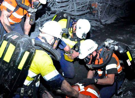 Thematic photo of a coal mine interior or a rescue team preparing for action
