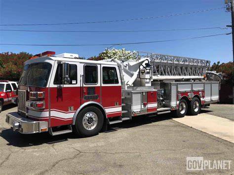 Thematic photo of a modern fire ladder truck in action