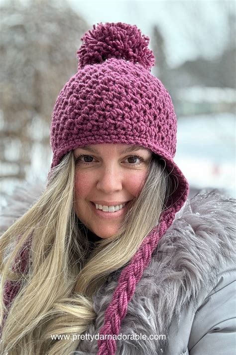 Infographic or diagram showing different ways an earflap hat can be worn (flaps up, flaps down, tied)