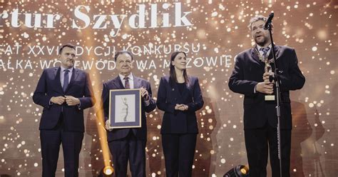 Zdjęcie przedstawiające dyplom Nagrody Marszałka Województwa Mazowieckiego lub uroczystość jej wręczenia