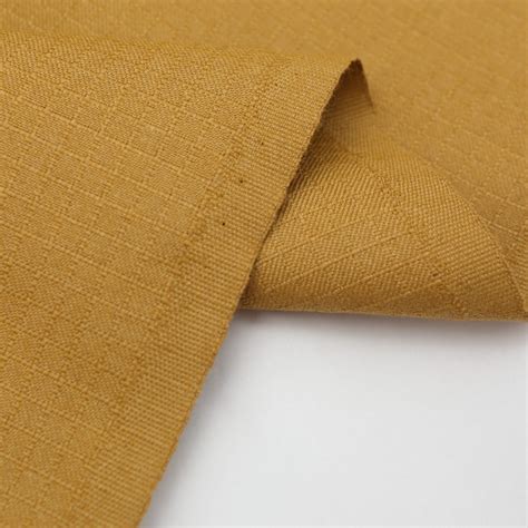 Zdjęcie zbliżenia na materiały rękawicy bojowej (Kevlar, Nomex)