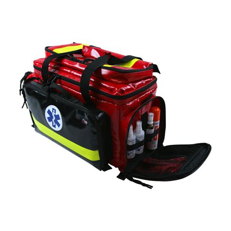 Zdjęcie przedstawiające zestaw ratowniczy, w którym centralne miejsce zajmuje nóż ratowniczy