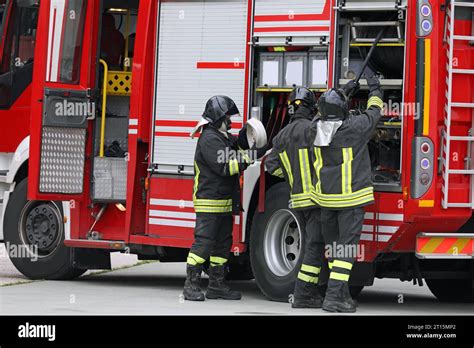 Thematic photo of firefighters in a fire truck during an alarm ride