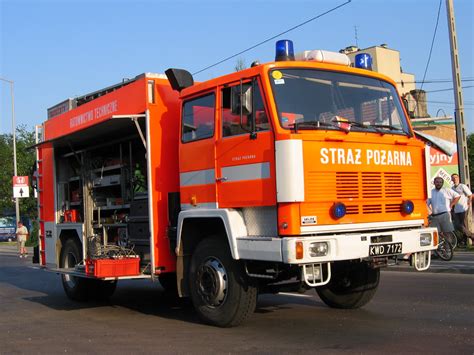 Photo of a Jelcz 422 fire truck, possibly in action or during a ceremony