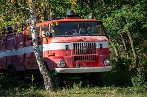 Old IFA W50 fire truck being towed away