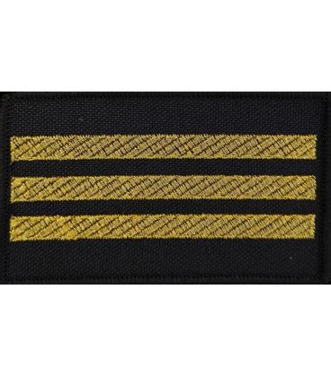 Photo of a firefighter's uniform with visible insignias of a sekcyjny or starszy sekcyjny, to illustrate the podoficer ranks.