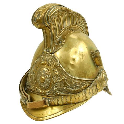 Photo of a historical ceremonial brass fire helmet