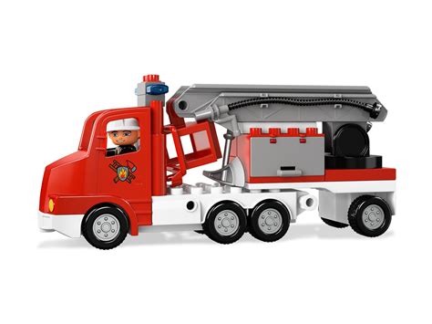Zdjęcie przedstawiające model LEGO Duplo 5682 wóz strażacki z figurką strażaka i rozłożoną drabiną