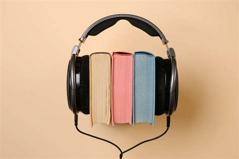 Thematic photo of a person listening to an audiobook on a smartphone or e-reader
