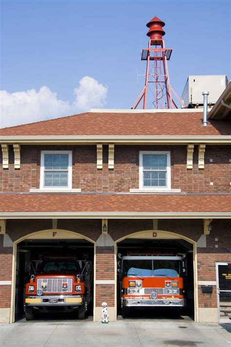 Thematic photo of an OSP fire station with a siren on the roof, perhaps against a dramatic sky