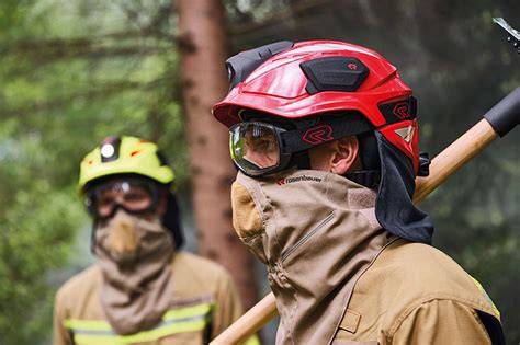 Thematic photo of a firefighter in Rosenbauer gear, looking ready for action