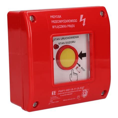 Zdjęcie przycisku przeciwpożarowego wyłącznika prądu z odpowiednim oznaczeniem.