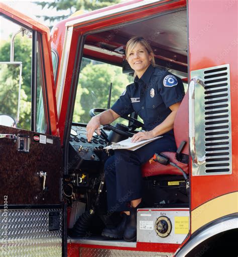 Thematic photo of a volunteer firefighter driving a fire truck in action