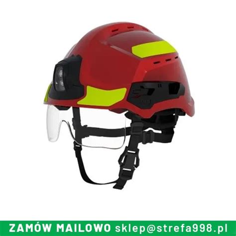 Używany hełm strażacki z opuszczaną szybką, prezentujący jego detale i mocowanie.