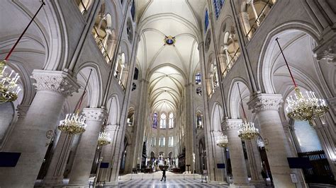 Architectural rendering of the reconstructed Notre Dame Cathedral, showcasing the restored spire and roof