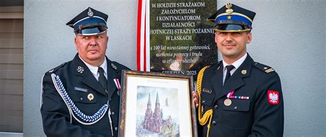 Portrety Stanisława Mikulaka i Grzegorza Matczyńskiego, przedstawiające ich w mundurach strażackich lub podczas oficjalnych wydarzeń.