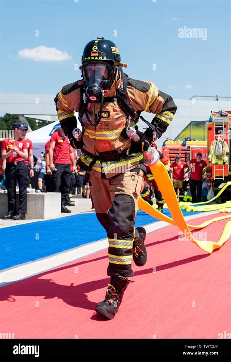 Thematic photo of firefighters competing in a sports and fire competition