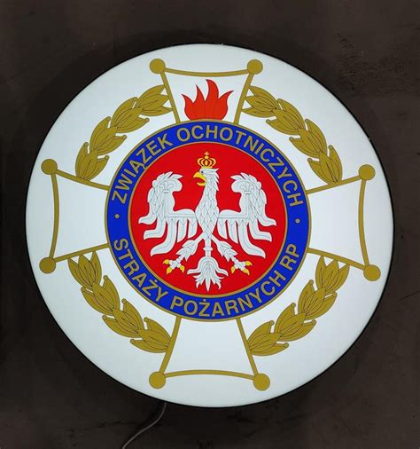 Znak Ochotniczej Straży Pożarnej, stylizowany na pamiątkową odznakę