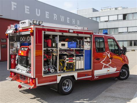 Opel Movano fire truck with specialized bodywork, showing side access to equipment
