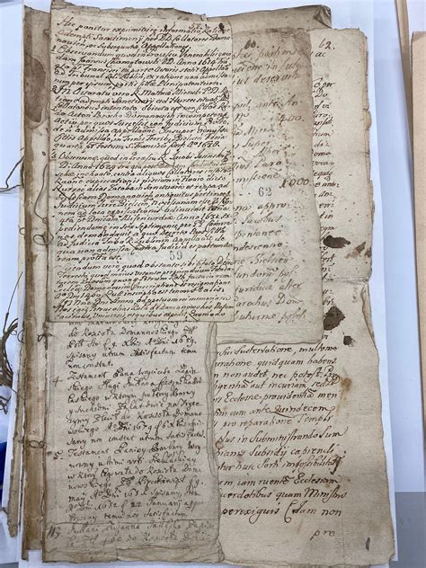 Prace konserwatorskie nad ocalonymi dokumentami archiwum