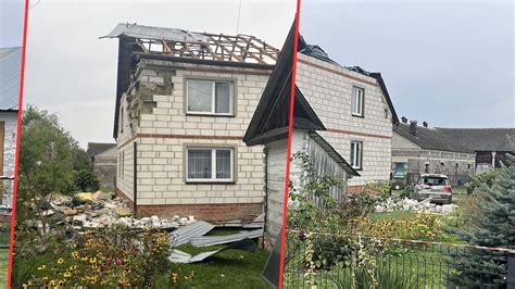 Rodzina Kondraciuków na tle zniszczonego domu