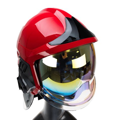 The MSA Gallet F1 XF helmet with a golden front shield and a firefighter wearing it.