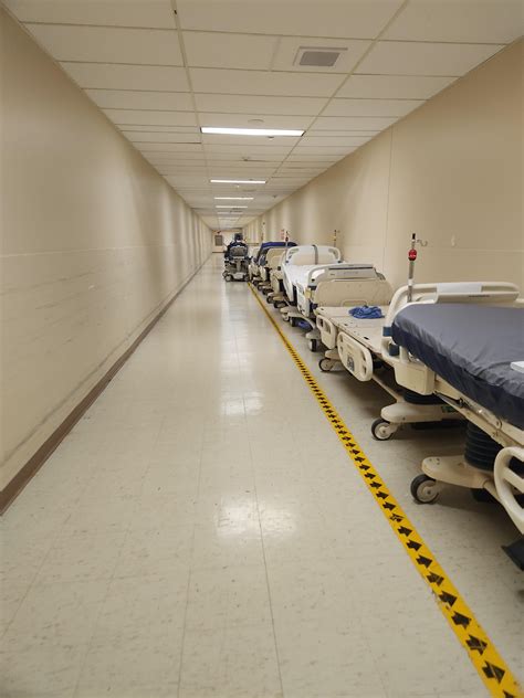 Photo of firefighters at a hospital entrance or a schematic of a hospital basement