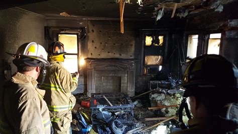 Photo of a house devastated by fire or fire investigation scene
