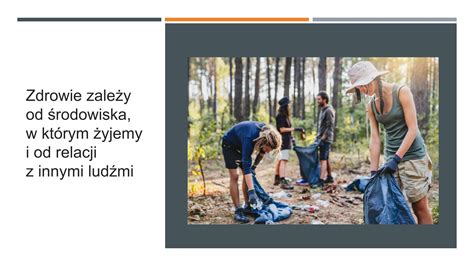 Zdjęcie przedstawiające akcję sprzątania terenu, grupę osób zbierających śmieci