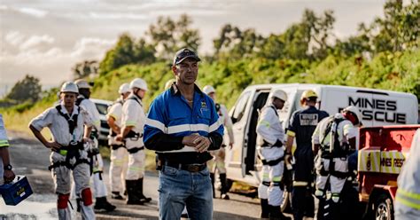 Thematic photo of miners during a rescue operation or evacuation from a mine