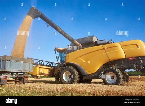 The head of a yellow harvester during a test of its functionality.