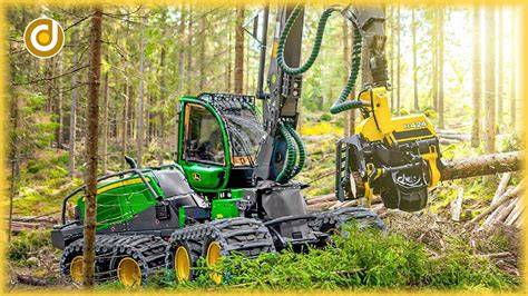 A green harvester cutting and processing timber in a forest clearing.