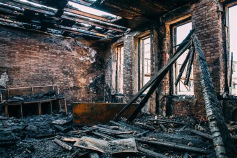 Thematic photo of fire damage, smoke, or a burned-out building facade.