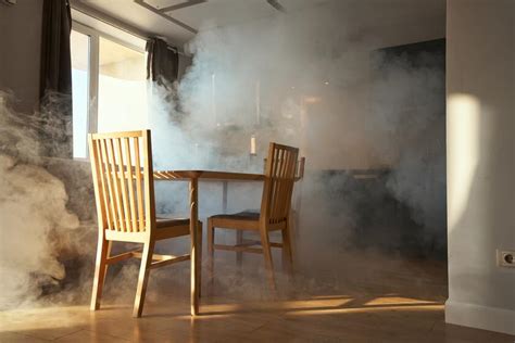Photo of a smoke-filled room inside a house after a fire