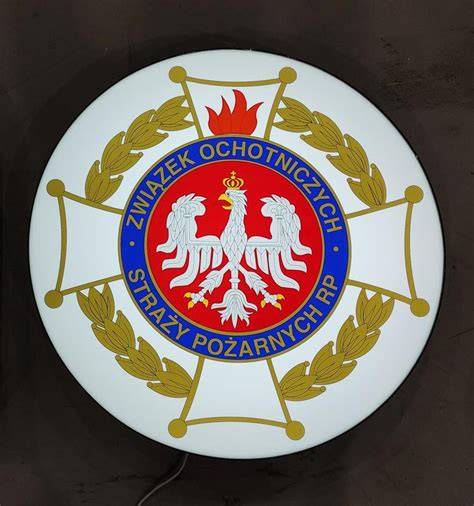 Znak graficzny Ochotniczej Straży Pożarnej lub strażak OSP podczas ćwiczeń