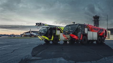 The Panther 6x6 ARFF (Aircraft Rescue and Fire Fighting) vehicle at an airport, showing its distinctive design and water cannon