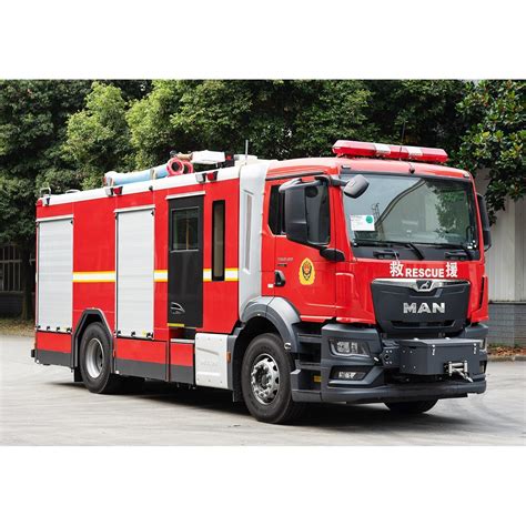 A specialized fire truck with a multi-functional basket, possibly on a MAN chassis, as described for PSP Kraków