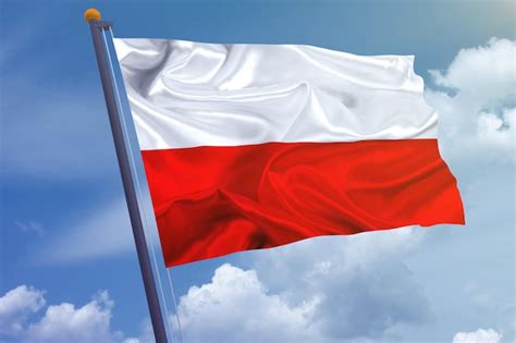 Polska flaga narodowa powiewająca na tle błękitnego nieba